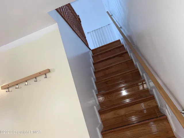 a view of livingroom with furniture and fireplace