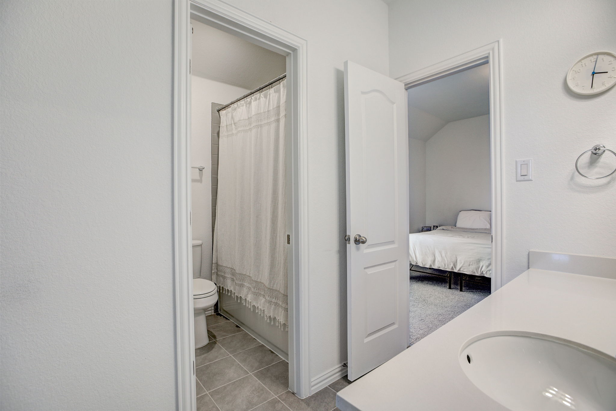 308 Monteforte Road Hutto, TX 78634 - Photo 21 of 32 a en suite bathroom with a sink and a mirror