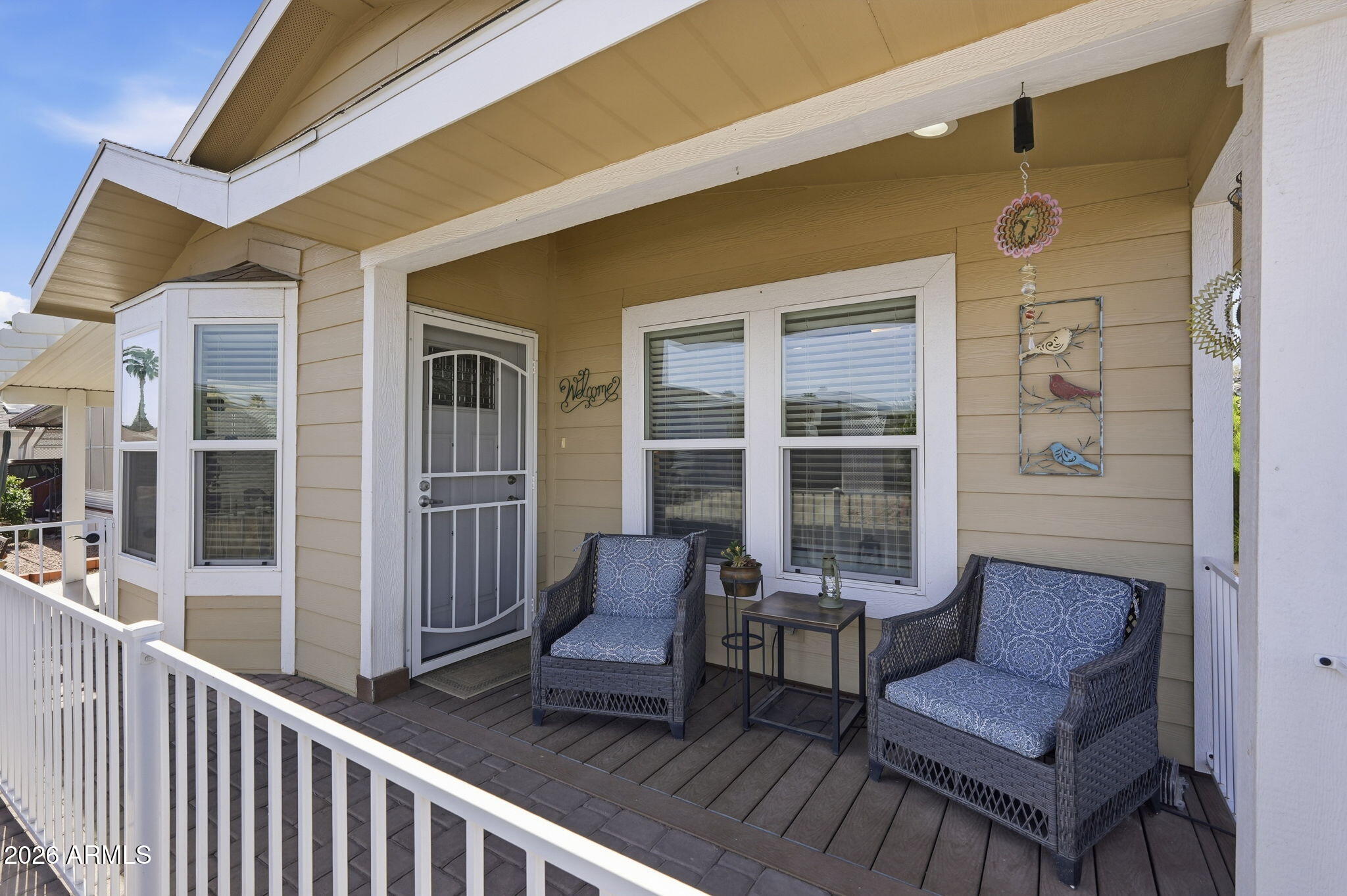 8865 East Baseline Road, Unit 1417 Mesa, AZ 85209 - Photo 7 of 47 a view of a two couches in the balcony
