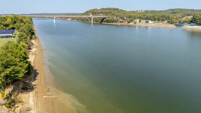 a view of a lake with mountains in the background
