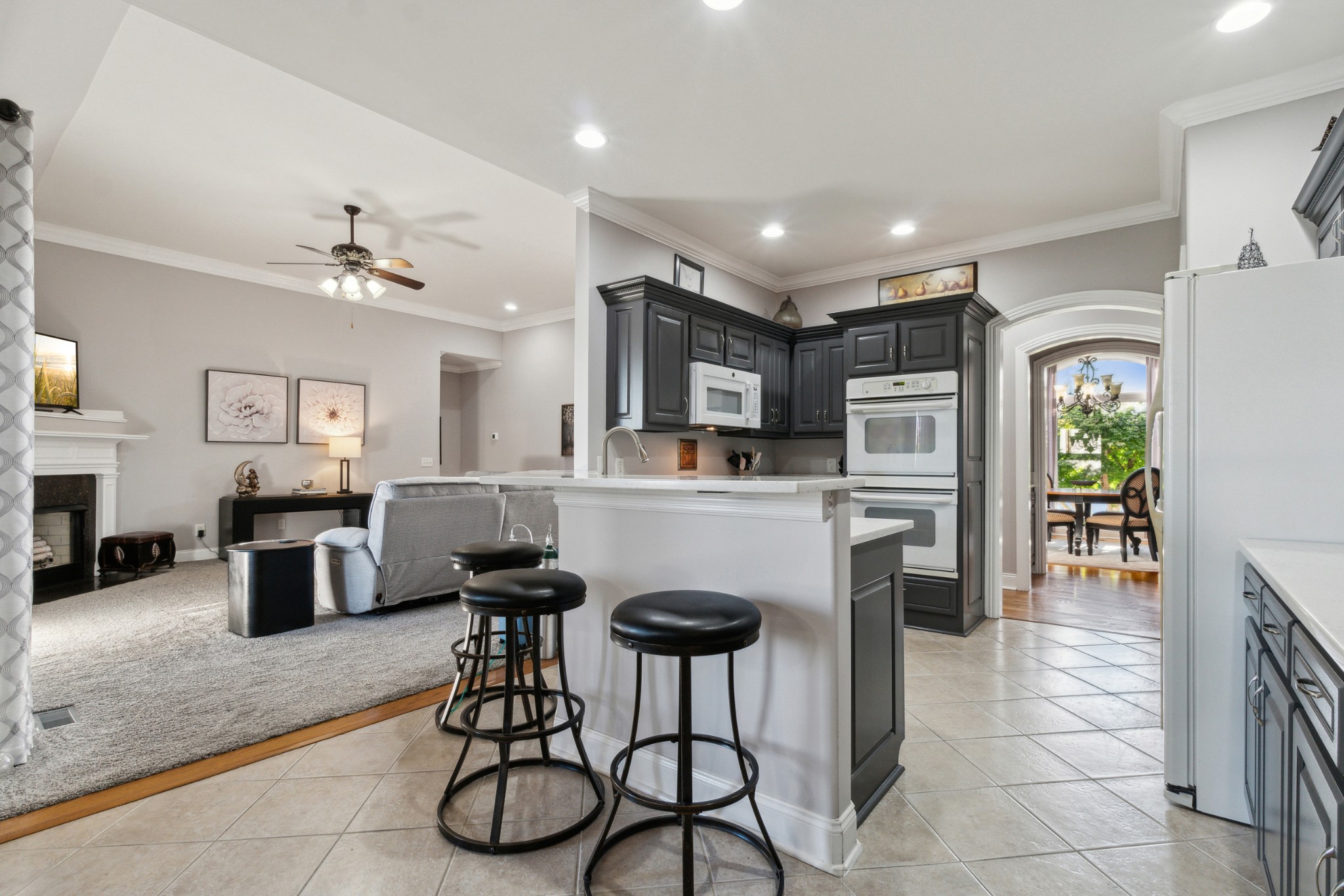 1014 Rhett Place Lebanon, TN 37087 - Photo 8 of 26 The kitchen flows nicely into the living room for easy entertaining.