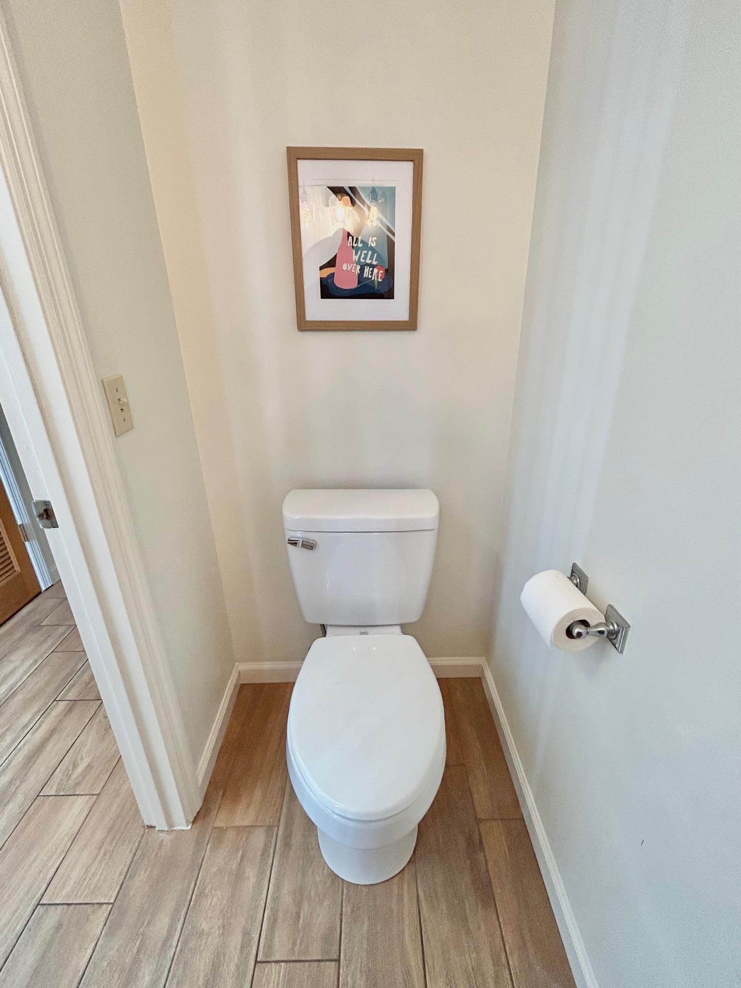 4 Moultrie Creek Circle St. Augustine, FL 32086 - Photo 25 of 55 a bathroom with a toilet and a mirror