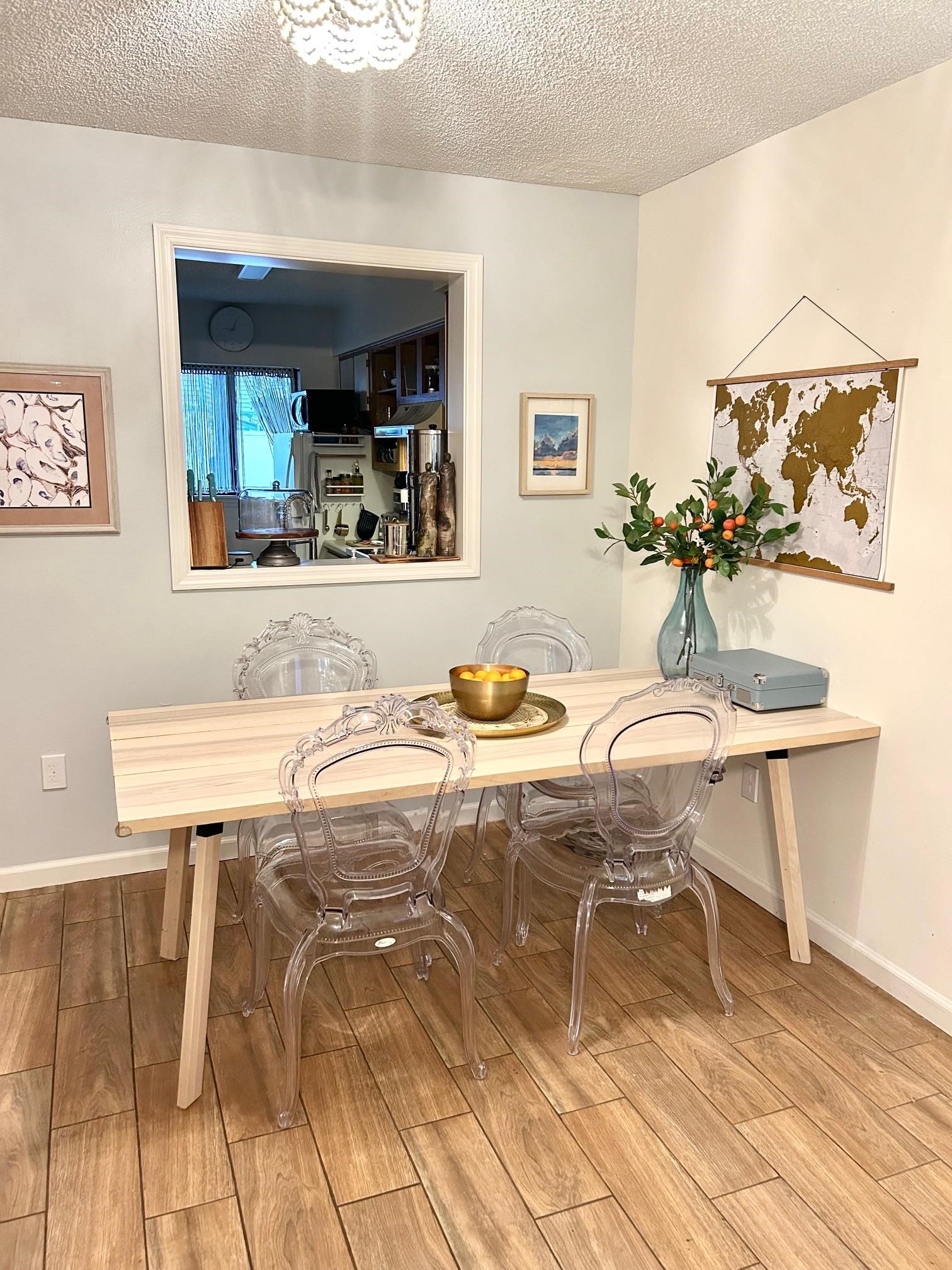 4 Moultrie Creek Circle St. Augustine, FL 32086 - Photo 35 of 55 a dining hall with granite countertop a dining table and chairs