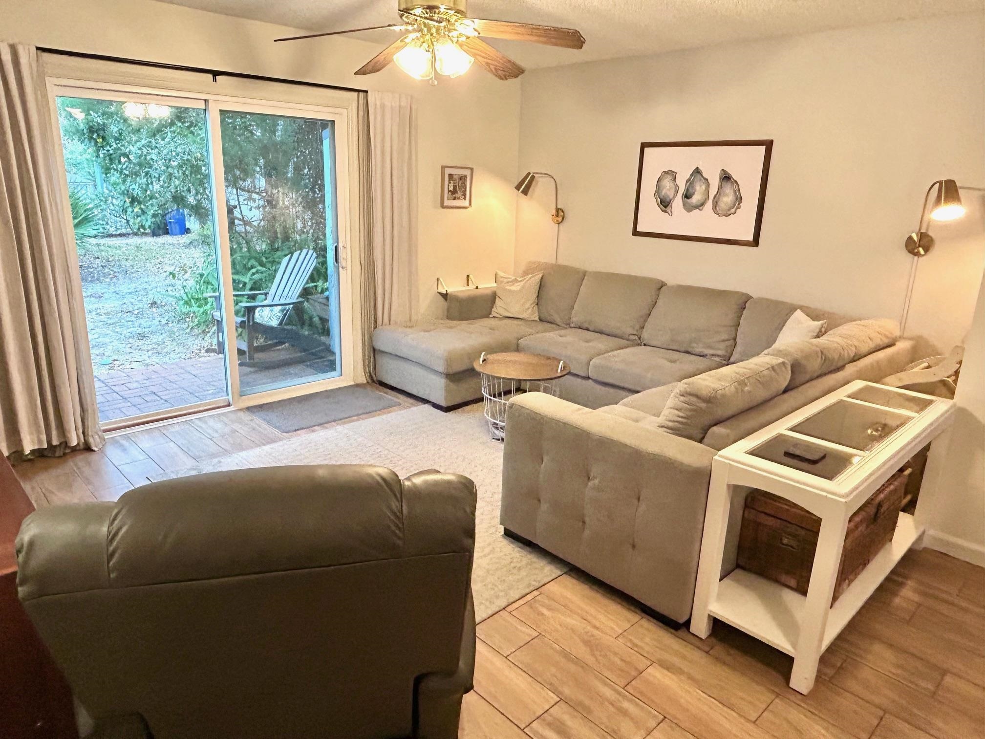 4 Moultrie Creek Circle St. Augustine, FL 32086 - Photo 40 of 55 a living room with furniture and a large window