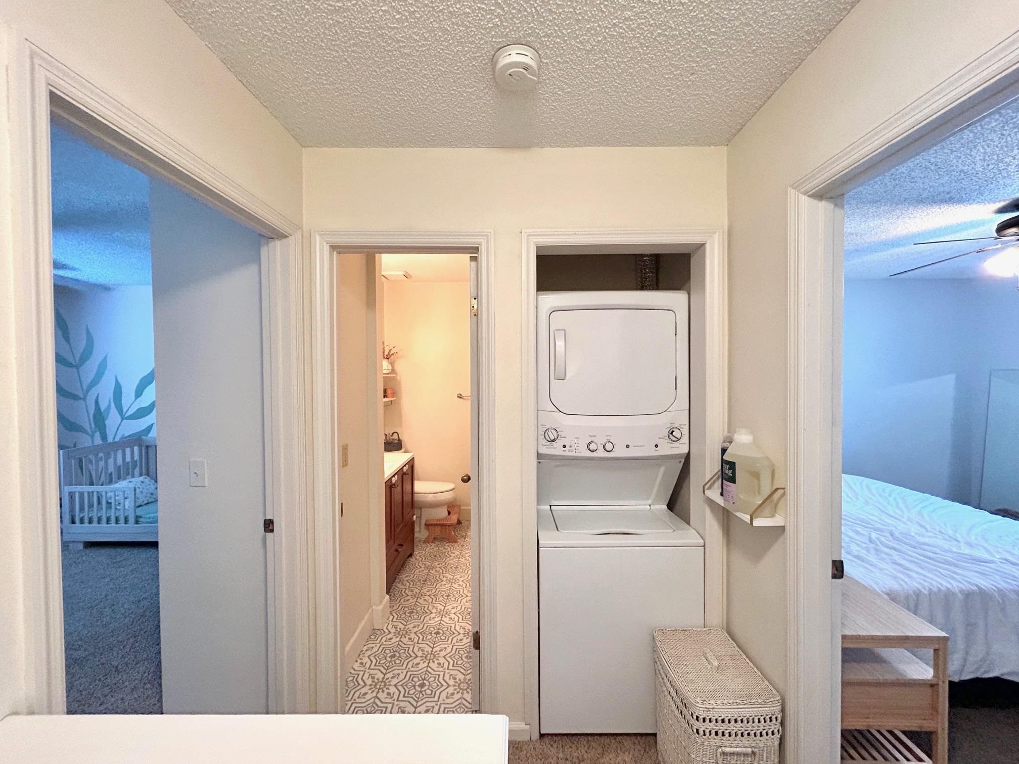 4 Moultrie Creek Circle St. Augustine, FL 32086 - Photo 48 of 55 a bathroom with a granite countertop toilet and a shower