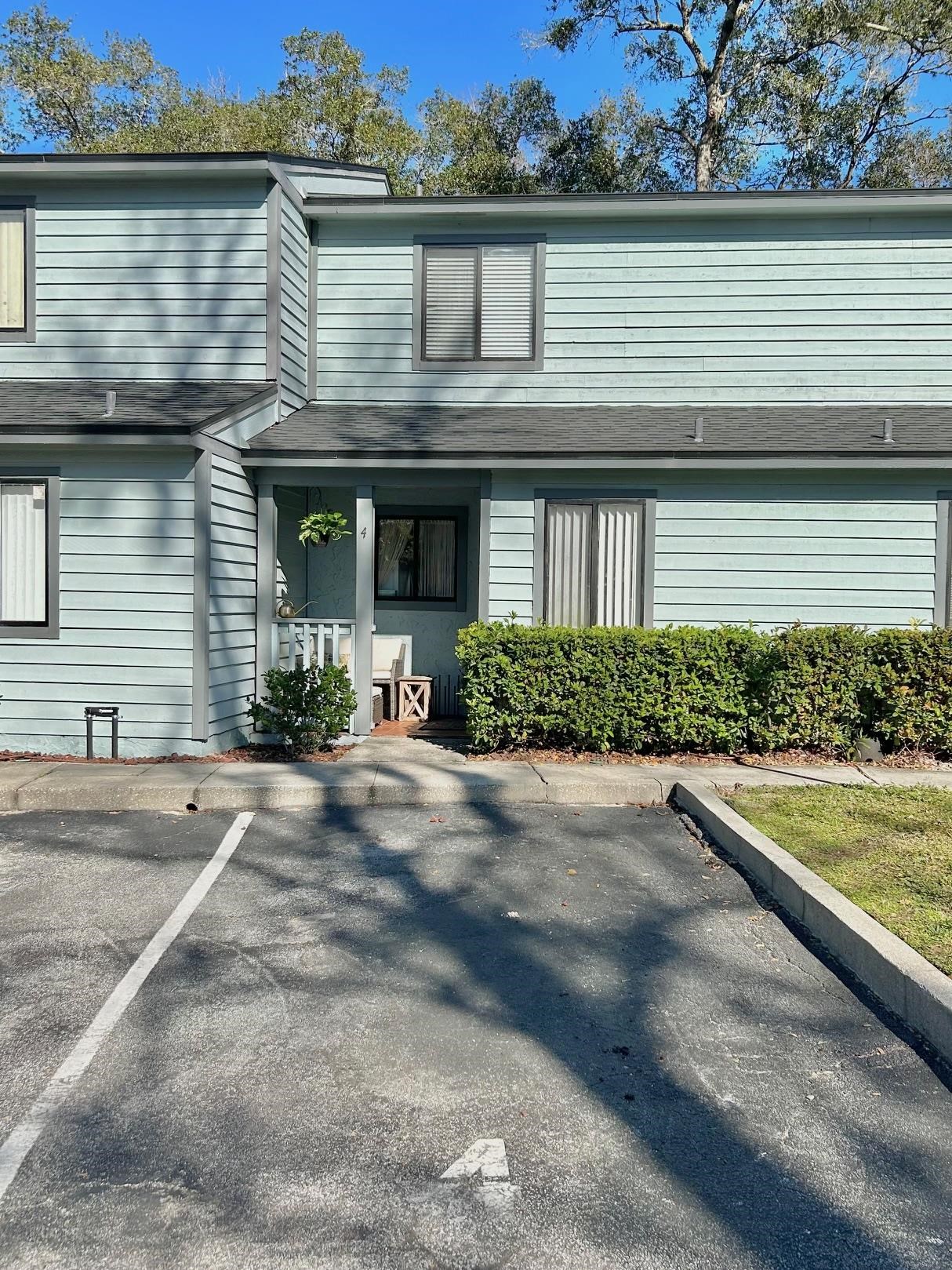 4 Moultrie Creek Circle St. Augustine, FL 32086 - Photo 8 of 55 a front view of a house with garden
