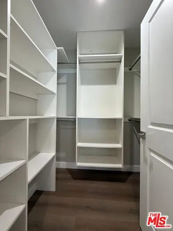 a refrigerator freezer sitting inside of a kitchen