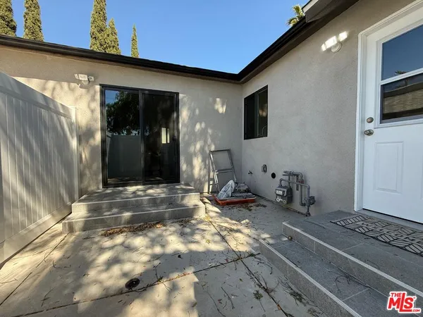 a living room with fireplace furniture and a flat screen tv