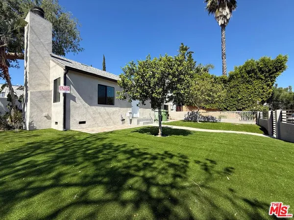 a fire hydrant in the middle of a field