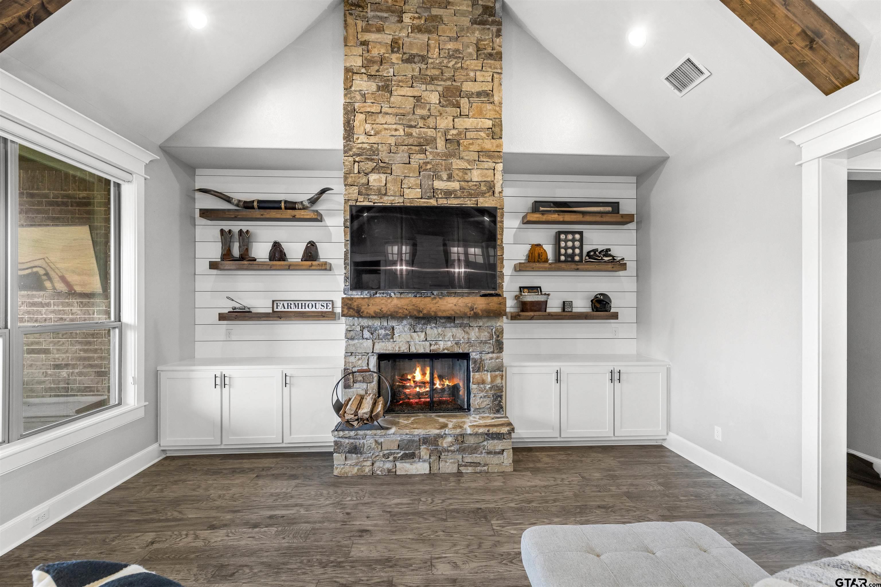 425 Coventry Street Bullard, TX 75757 - Photo 4 of 35 a living room with furniture and a fireplace
