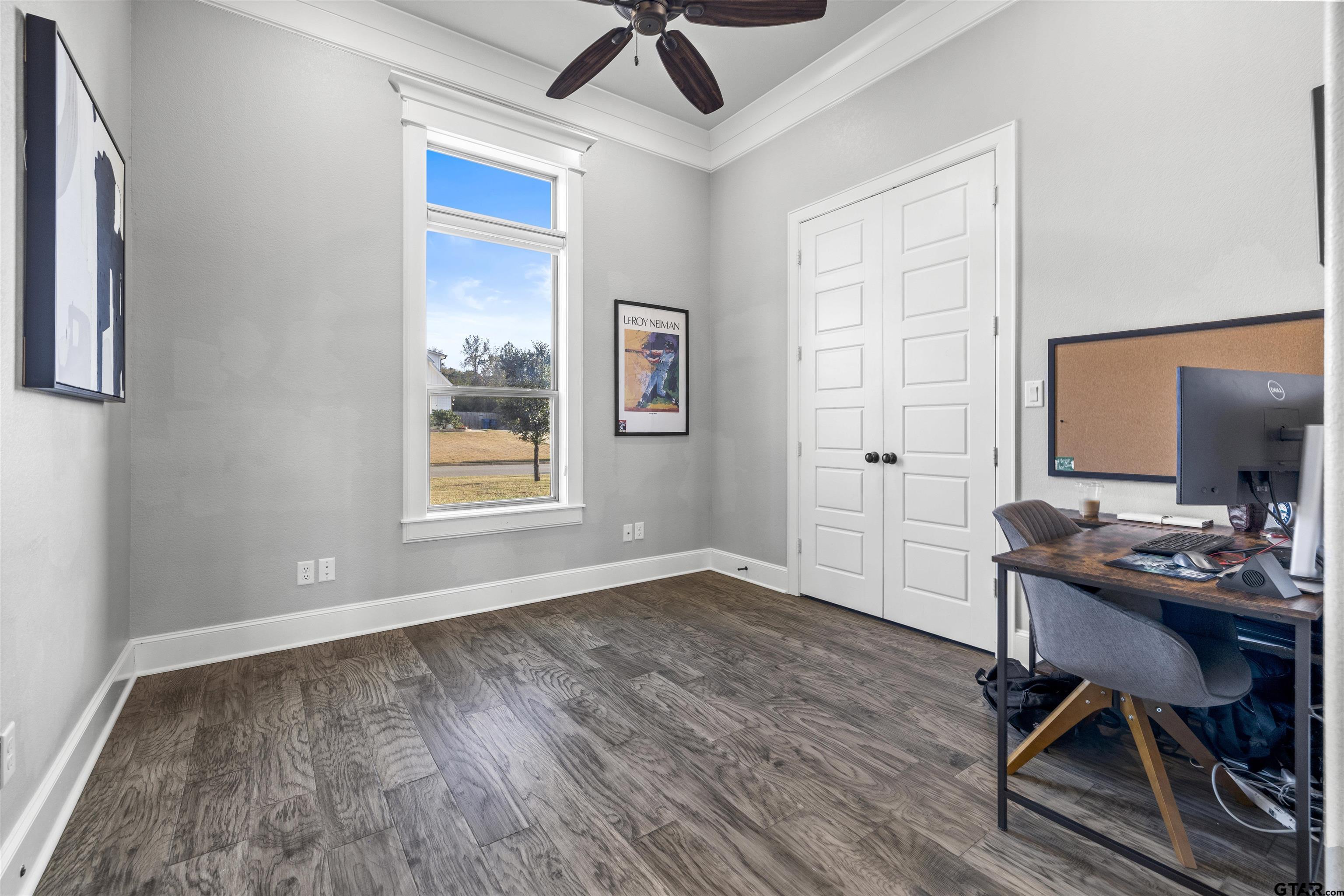 425 Coventry Street Bullard, TX 75757 - Photo 10 of 35 a workspace with wooden floor and a window