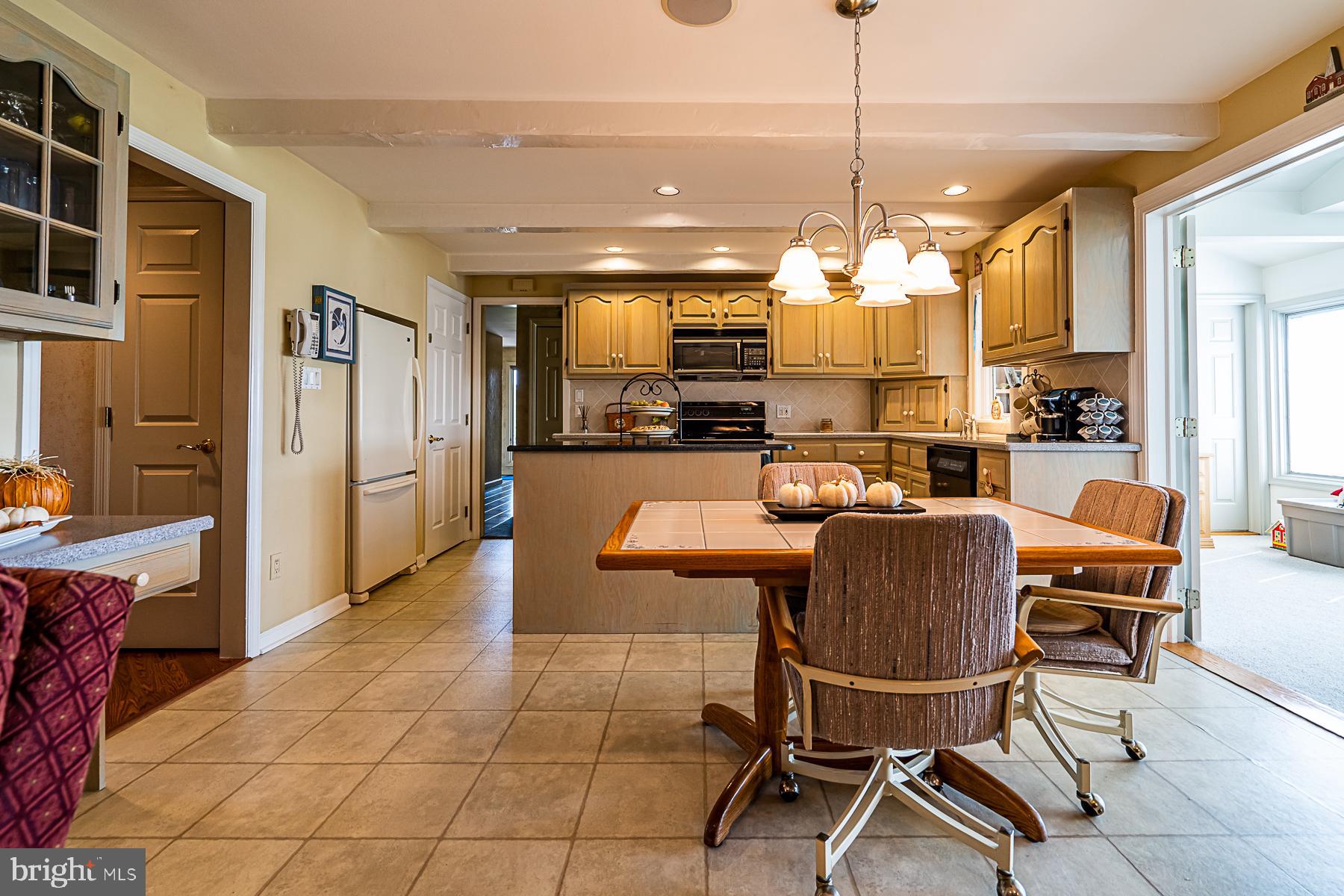 712 Godshall Road Telford, PA 18969 - Photo 8 of 53 living view into dining area & kitchen