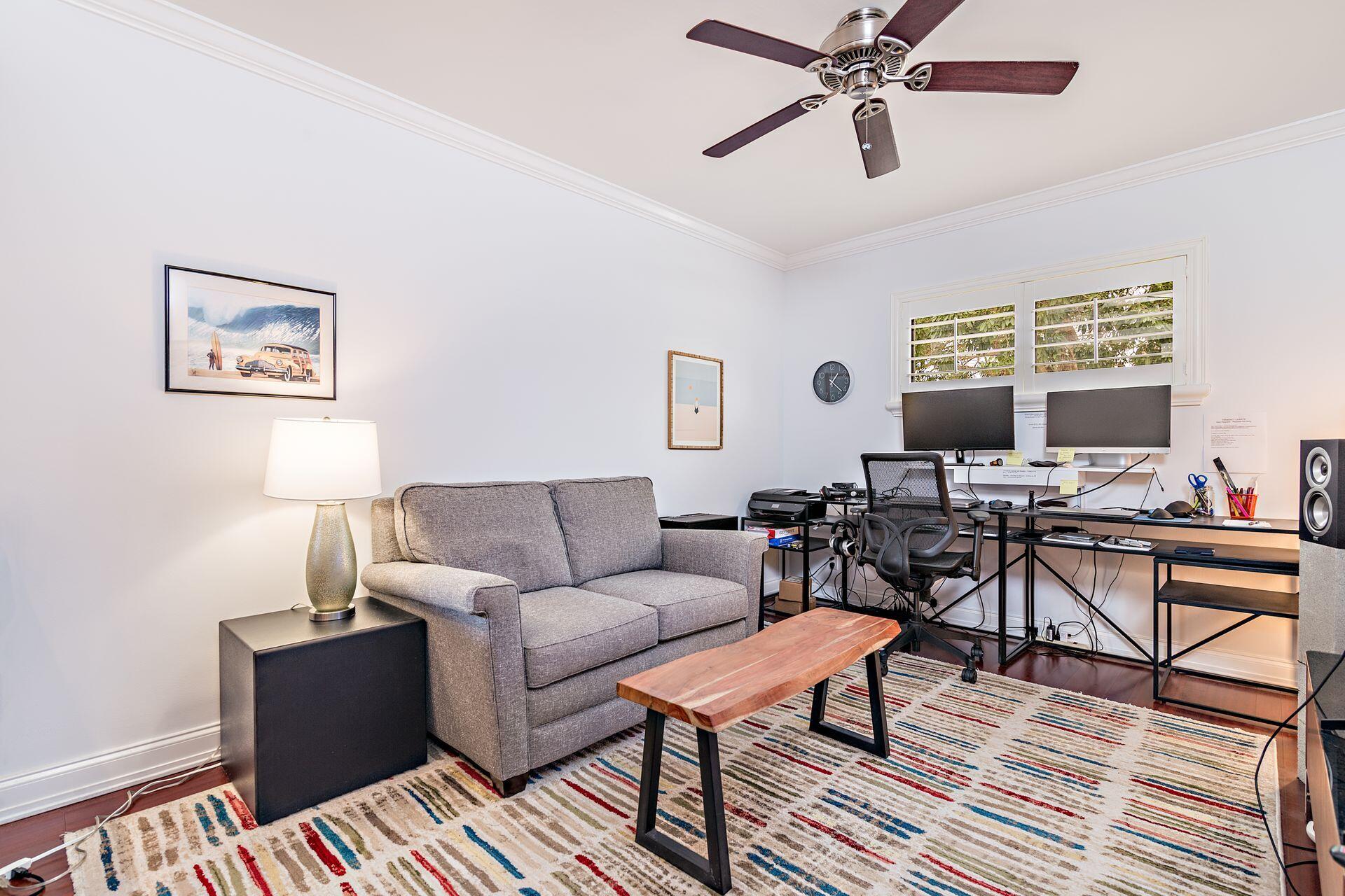 17138 Waterbend Drive, Unit 216 Jupiter, FL 33477 - Photo 10 of 20 a living room with furniture and a window