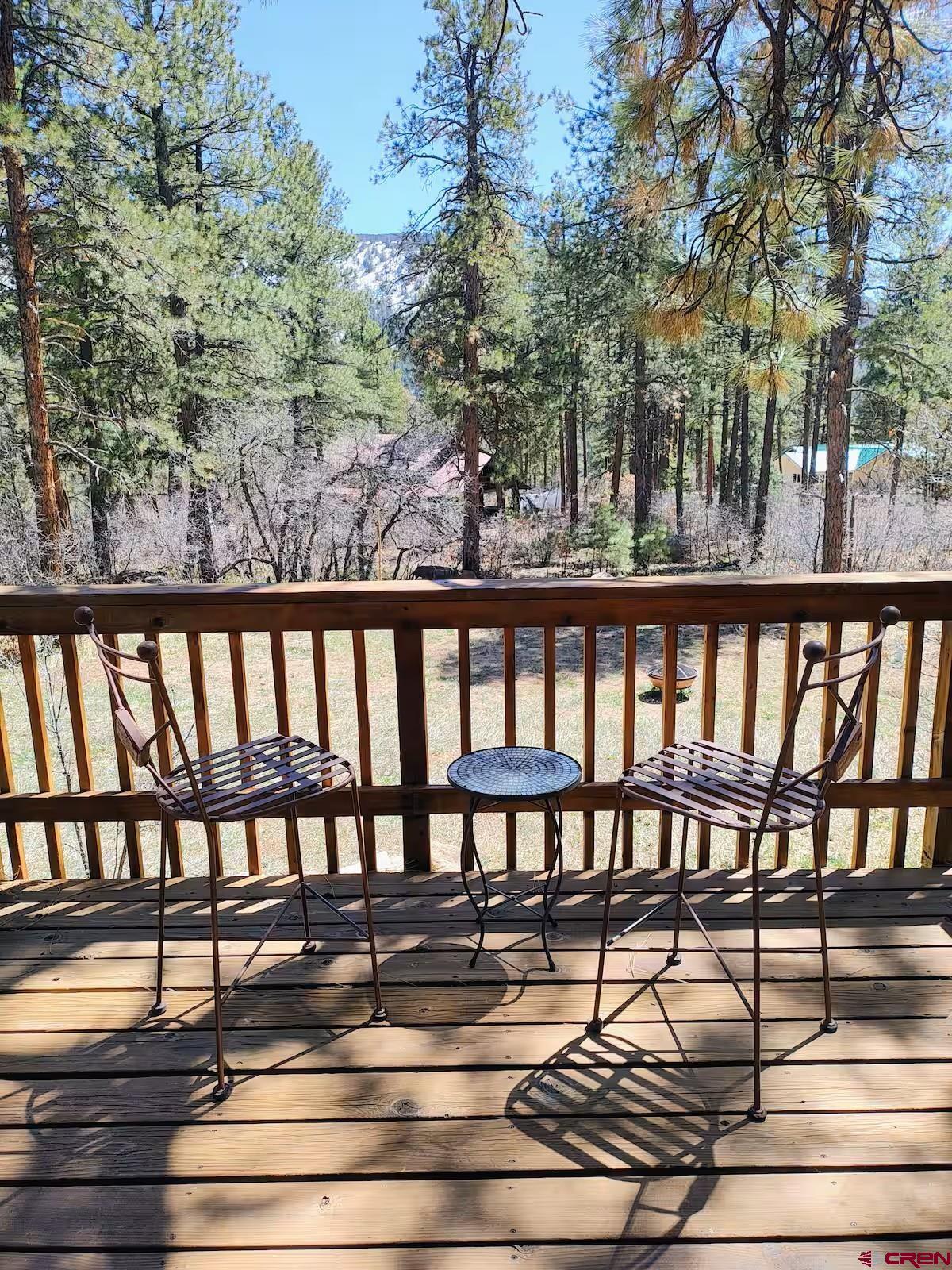 360 Sortais Road Durango, CO 81301 - Photo 33 of 36 a view of a chairs and table on the deck