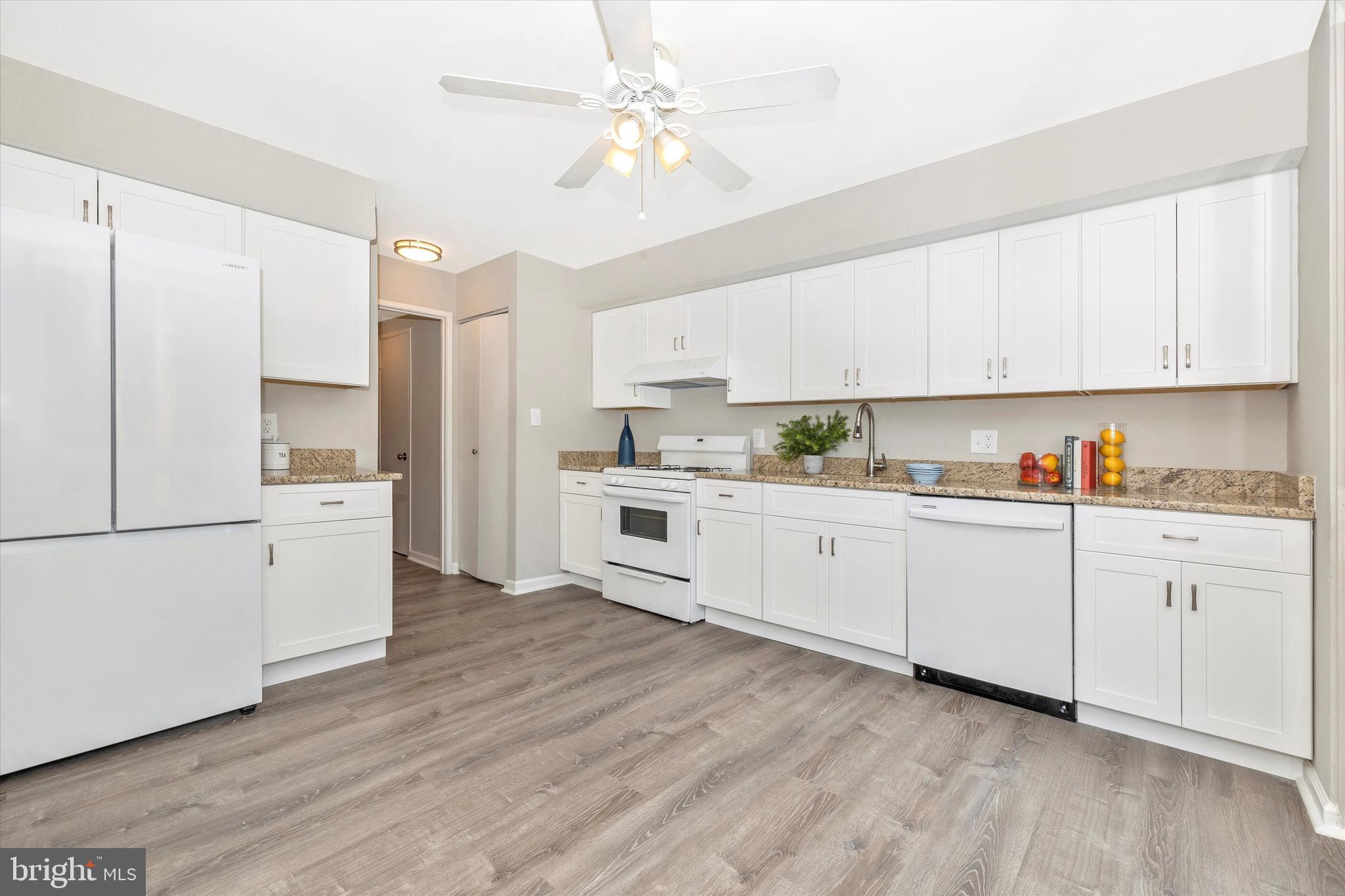 10586 Faulkner Ridge Circle Columbia, MD 21044 - Photo 10 of 28 Kitchen with White Cabinetry
