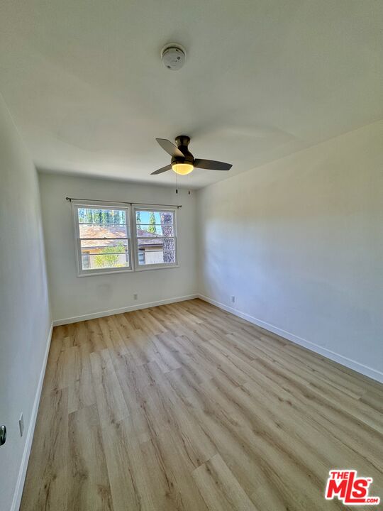 7733 Apperson Street Tujunga, CA 91042 - Photo 4 of 13 a view of an empty room and a window