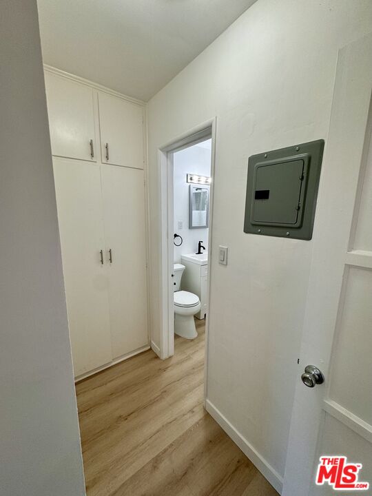 7733 Apperson Street Tujunga, CA 91042 - Photo 7 of 13 a bathroom with a toilet and a shower