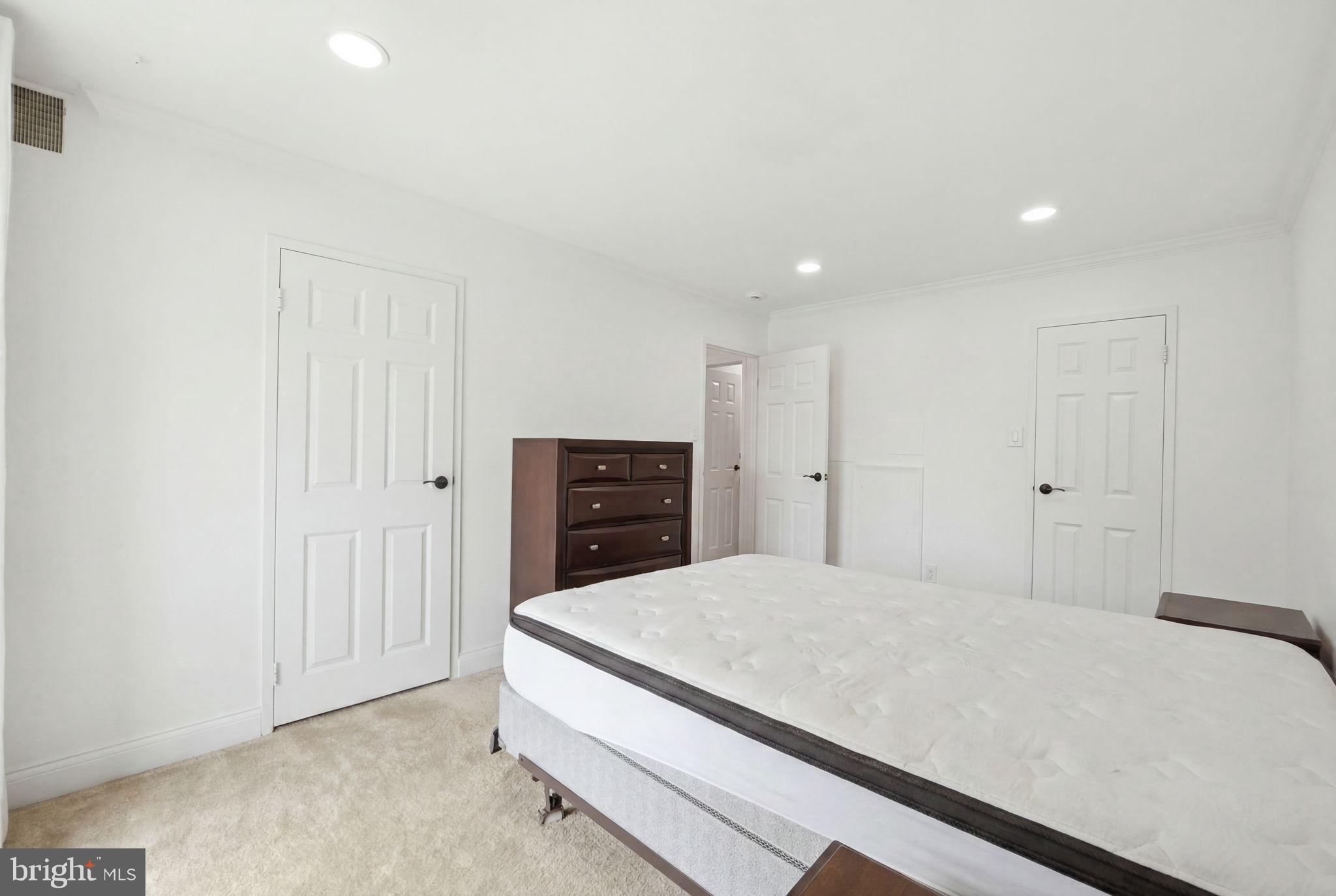 6141 Edsall Road, Unit E Alexandria, VA 22304 - Photo 14 of 16 Bright and airy bedroom retreat.