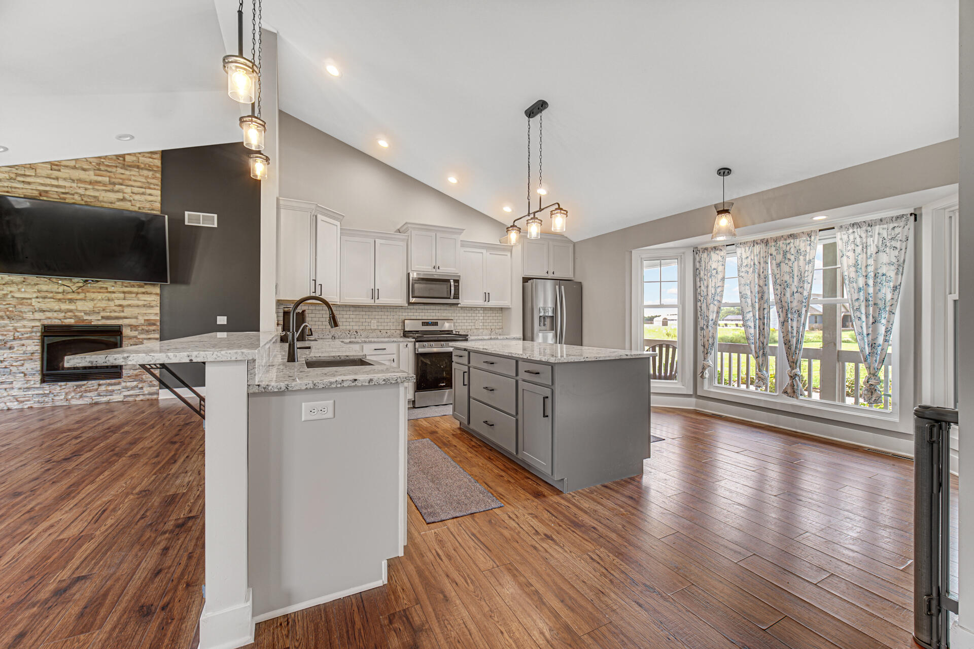 4455 Autumn Ridge Wheatfield, IN 46392 - Photo 16 of 33 a kitchen with counter top space a sink appliances and cabinets
