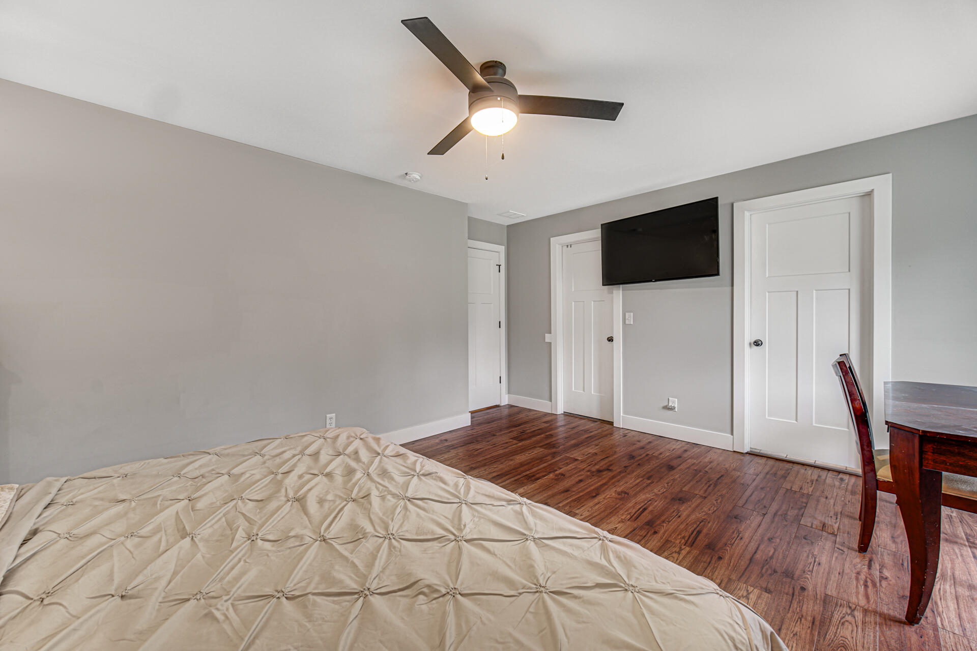 4455 Autumn Ridge Wheatfield, IN 46392 - Photo 21 of 33 a bedroom with a bed and a flat screen tv