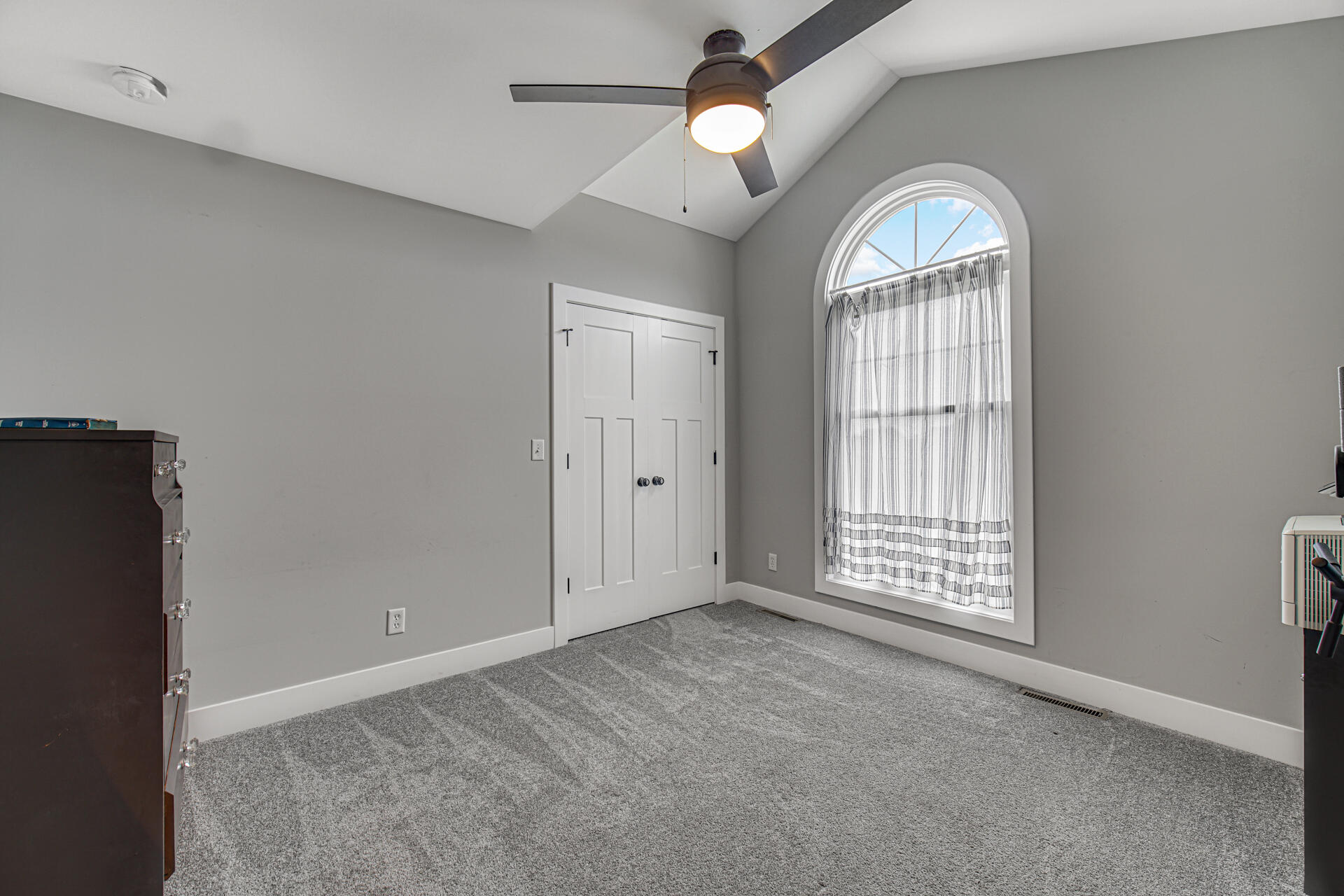 4455 Autumn Ridge Wheatfield, IN 46392 - Photo 25 of 33 an empty room with windows and ceiling fan