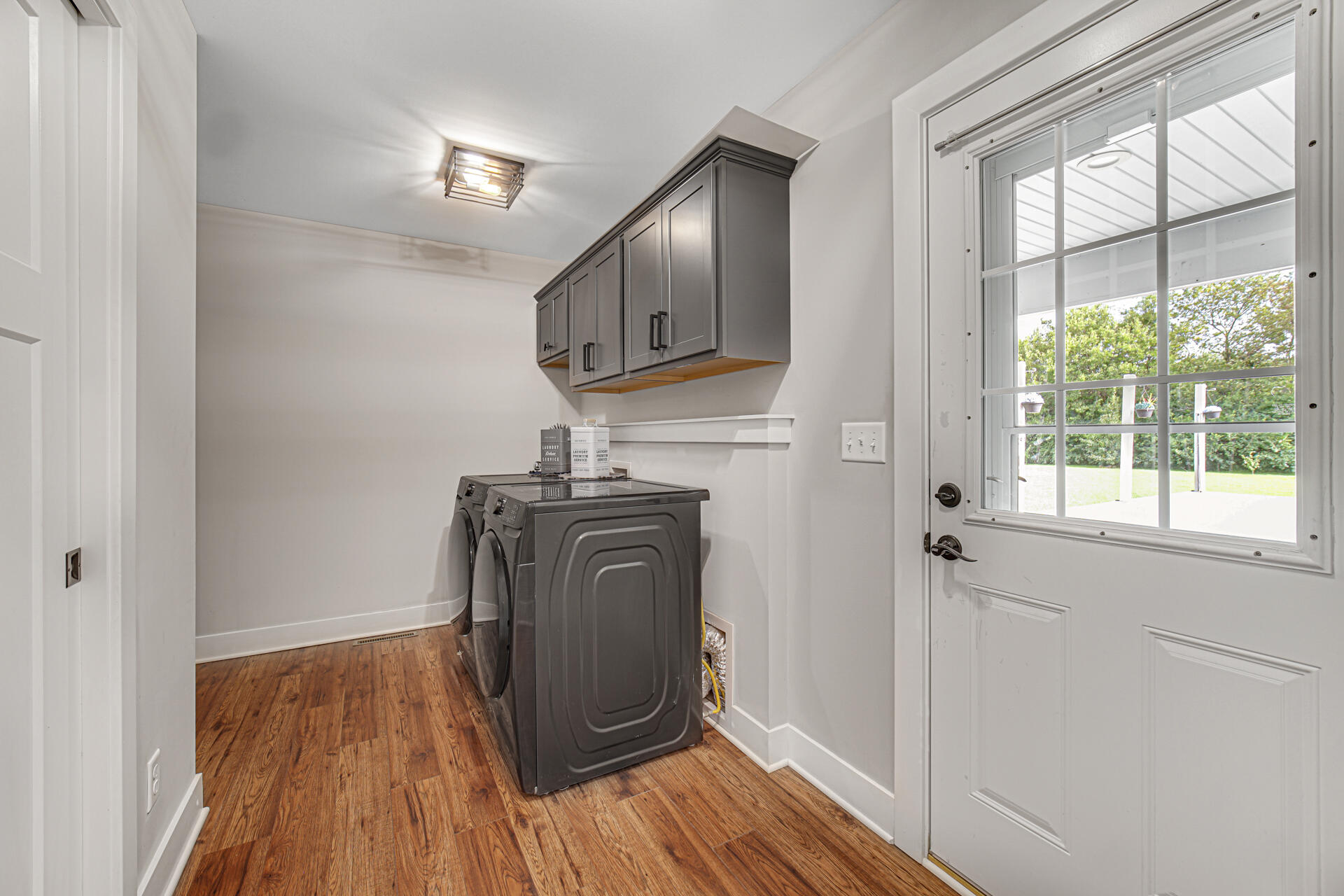 4455 Autumn Ridge Wheatfield, IN 46392 - Photo 29 of 33 a view of a livingroom with wooden floor and a ceiling fan