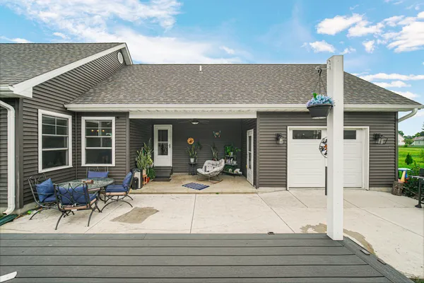 a house view with outdoor seating space