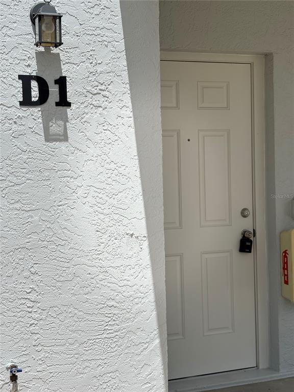 26485 Rampart Boulevard, Unit D1 Punta Gorda, FL 33983 - Photo 28 of 29 a bathroom with a shower