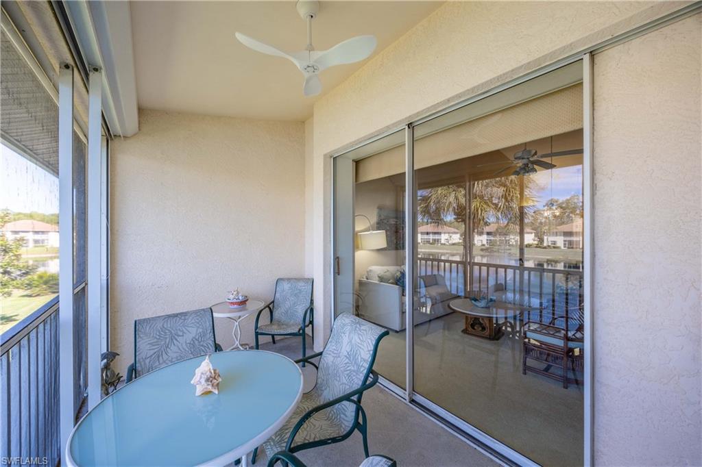 290 Robin Hood Circle, Unit 201 Naples, FL 34104 - Photo 23 of 34 a view of a dining room with furniture window and outside view