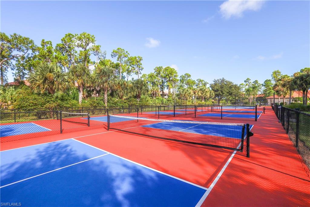 290 Robin Hood Circle, Unit 201 Naples, FL 34104 - Photo 30 of 34 a park with an outdoor space