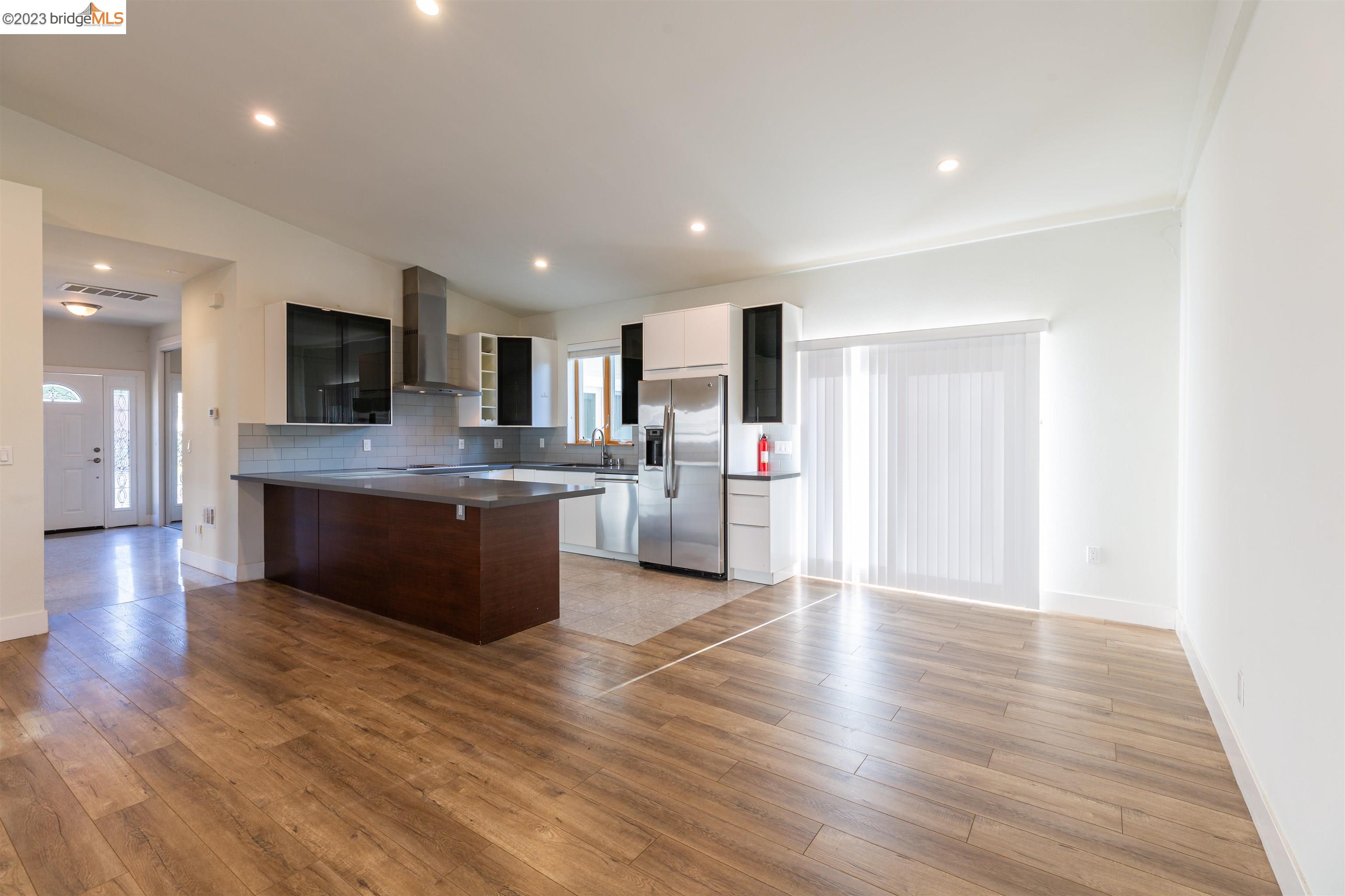 2191 Pleasant Hill Road Pleasant Hill, CA 94523 - Photo 13 of 35 a large kitchen with stainless steel appliances granite countertop a large counter top and a stove top oven