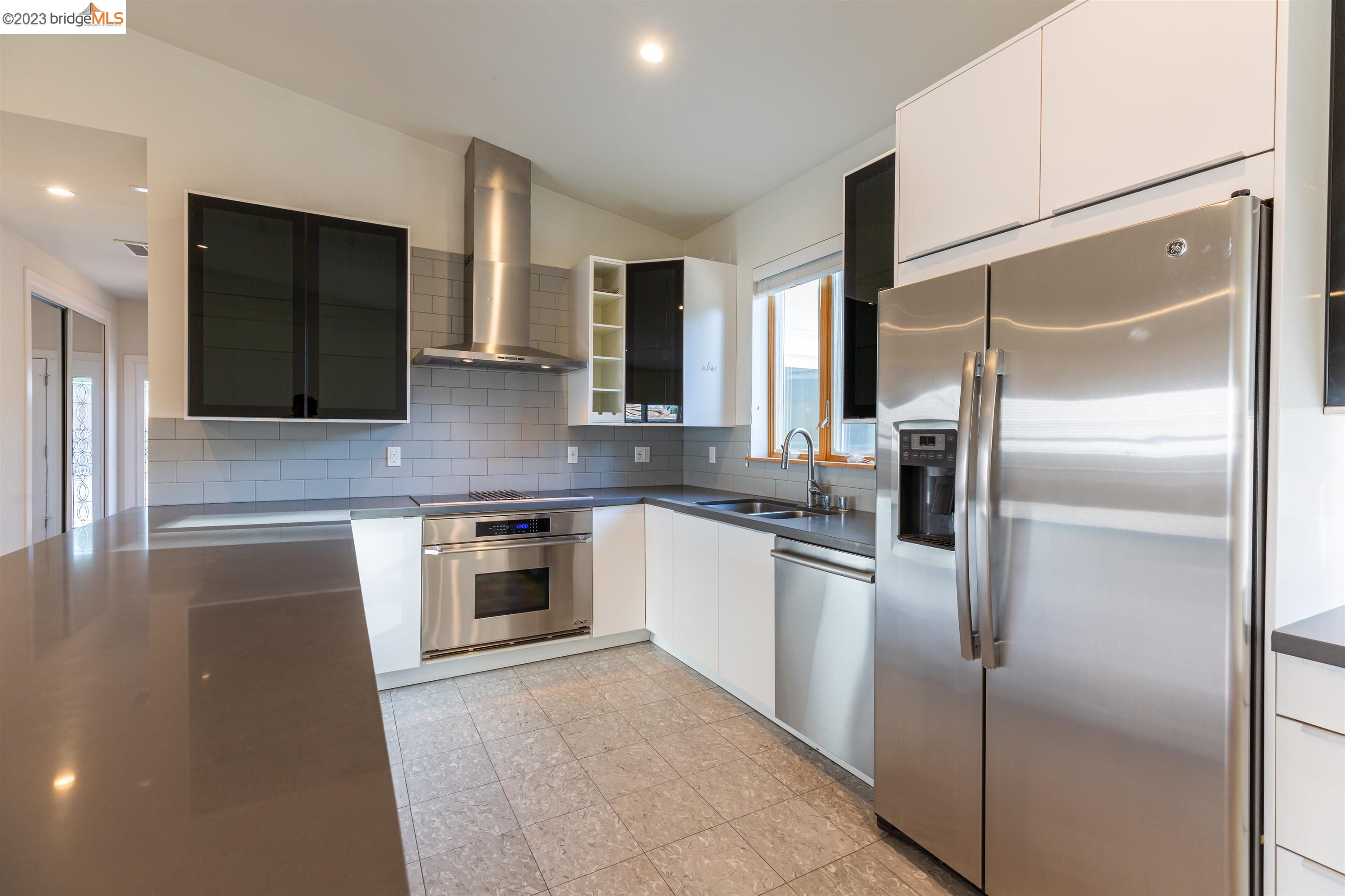 2191 Pleasant Hill Road Pleasant Hill, CA 94523 - Photo 17 of 35 a kitchen with a refrigerator sink and microwave