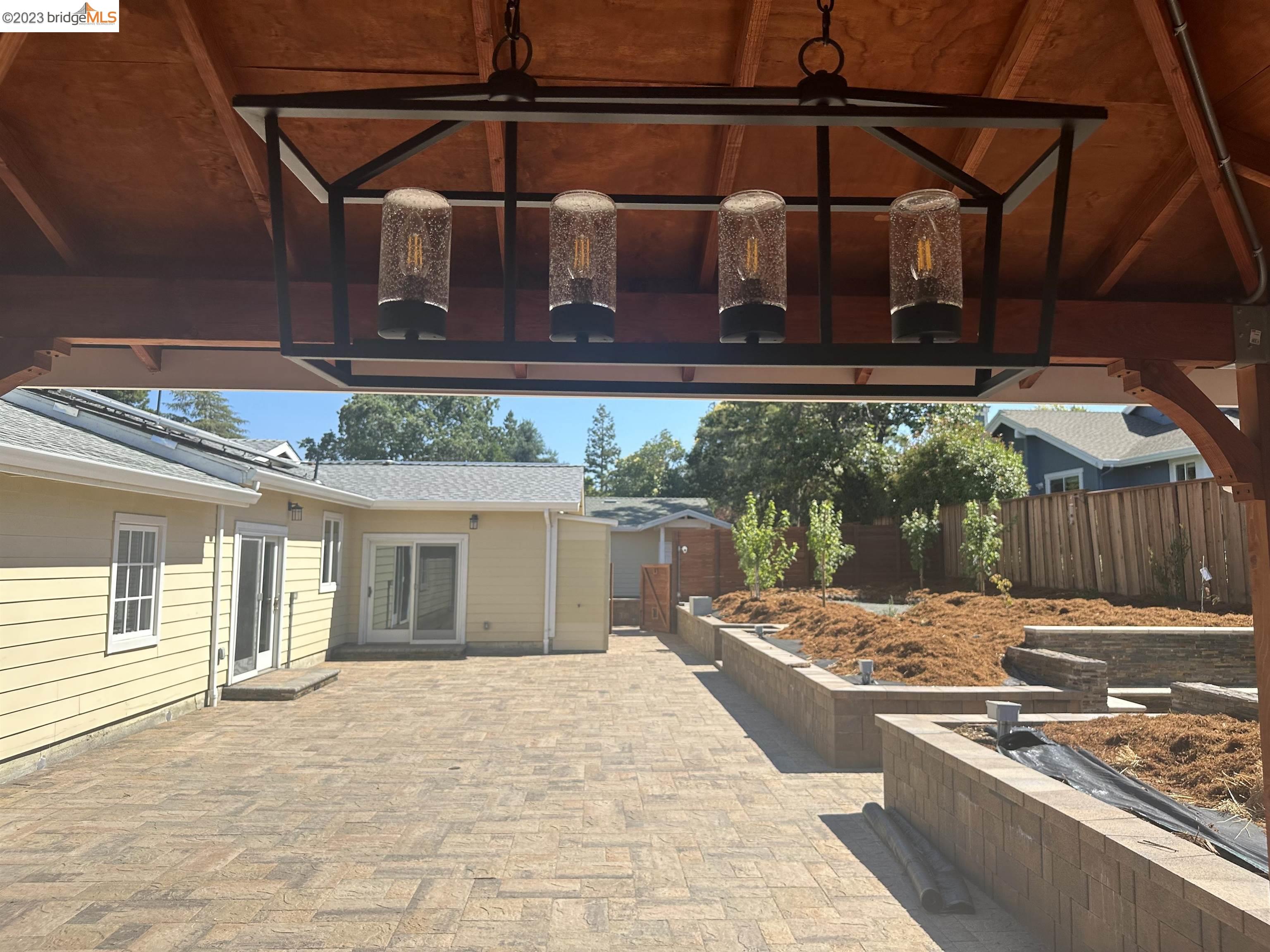 2191 Pleasant Hill Road Pleasant Hill, CA 94523 - Photo 28 of 35 a backyard of a house with a yard and outdoor seating