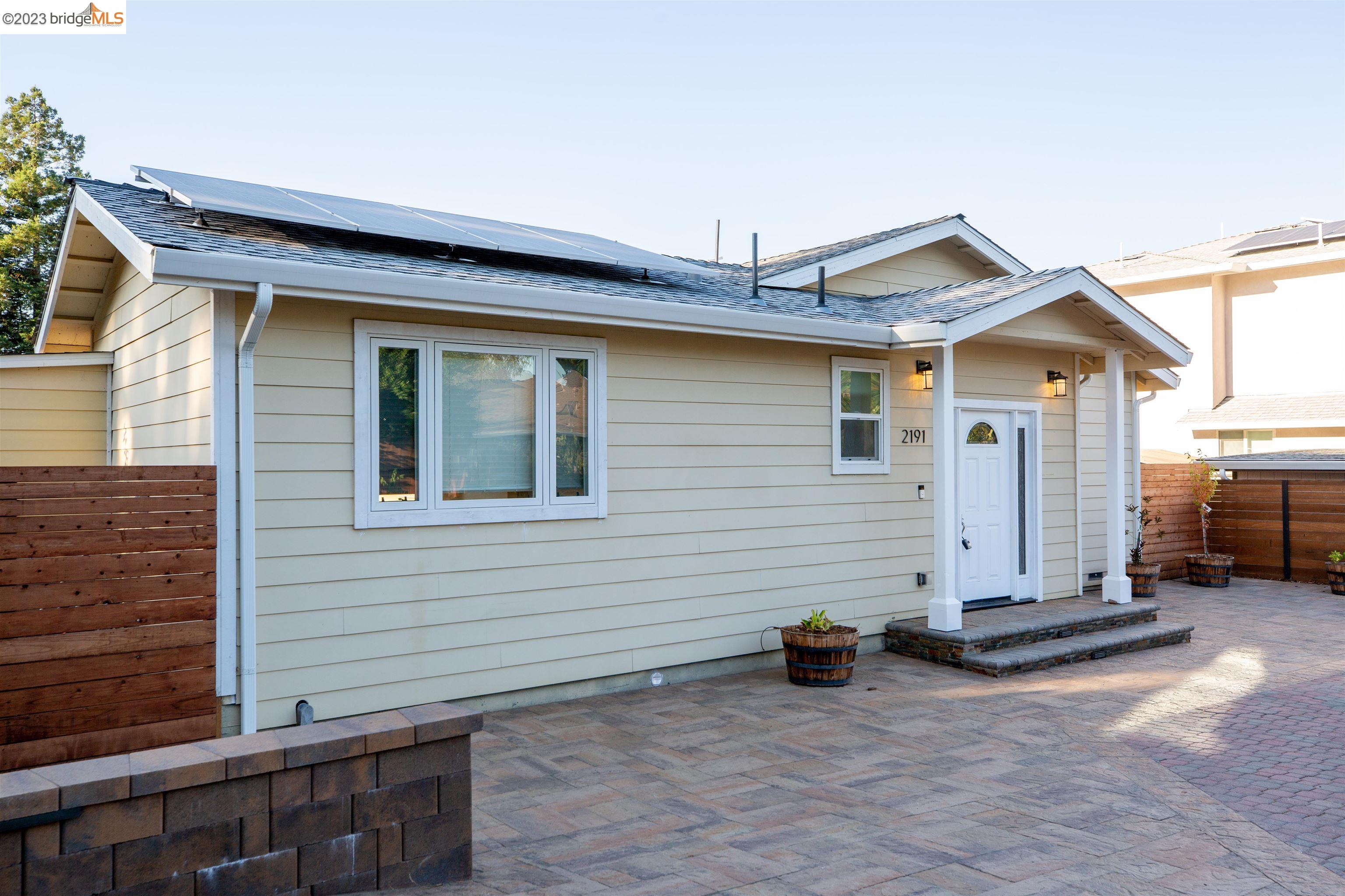2191 Pleasant Hill Road Pleasant Hill, CA 94523 - Photo 3 of 35 a view of a house with yard and parking space