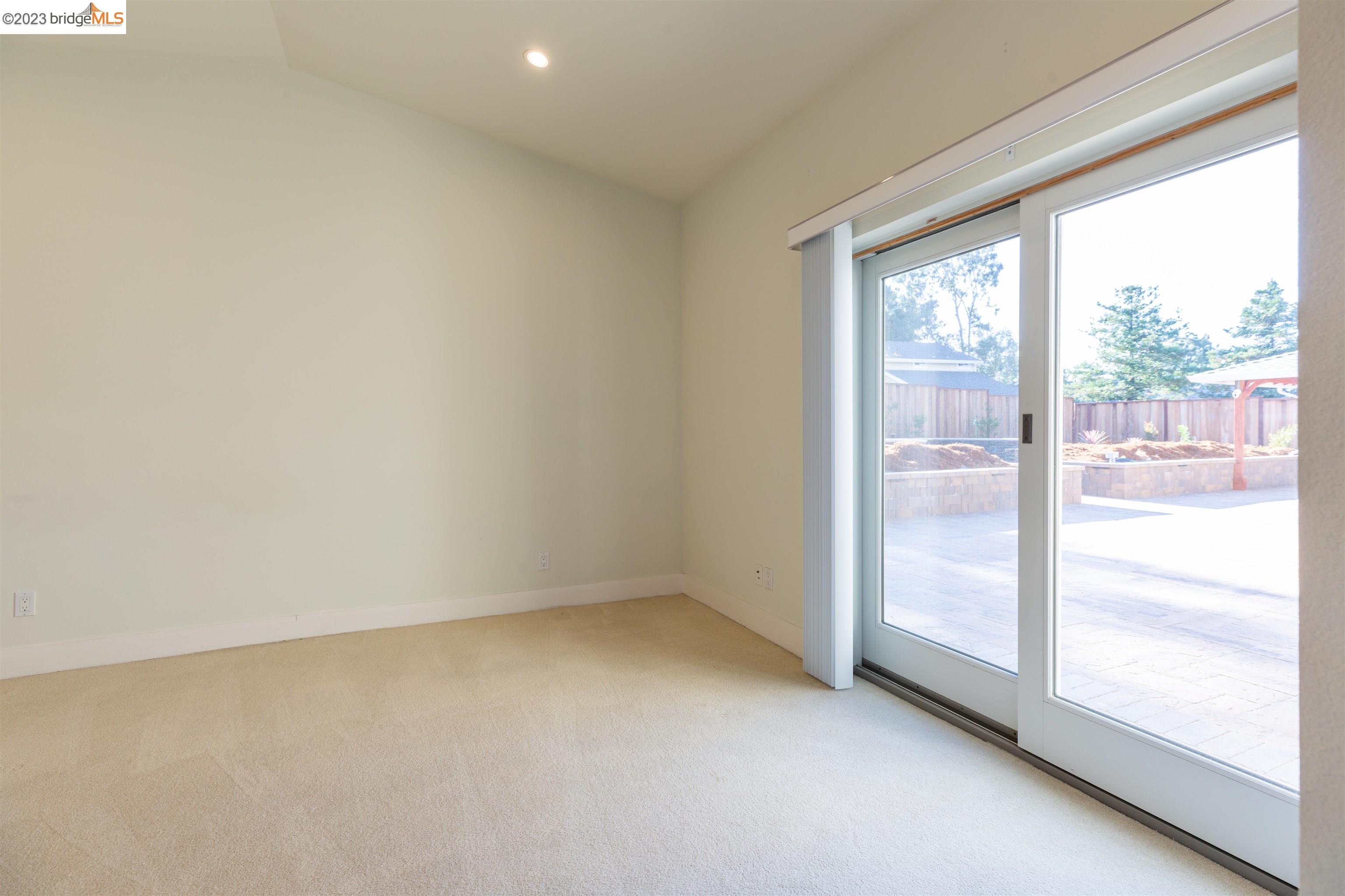 2191 Pleasant Hill Road Pleasant Hill, CA 94523 - Photo 8 of 35 an empty room with wooden floor and windows