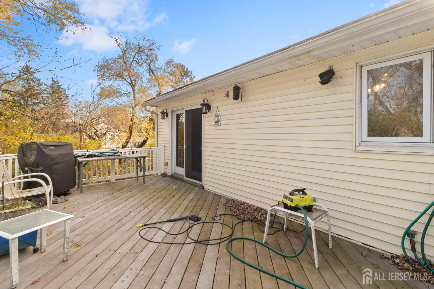 55 Sullivan Way East Brunswick, NJ 08816 - Photo 27 of 38 a view of a chairs and table on the wooden floor