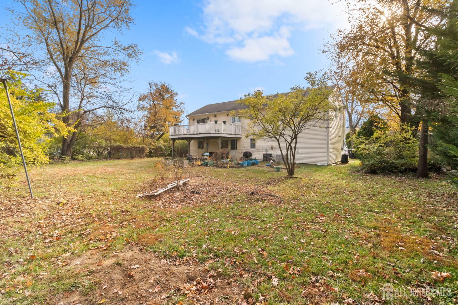 55 Sullivan Way East Brunswick, NJ 08816 - Photo 29 of 38 a view of large yard with plants and trees