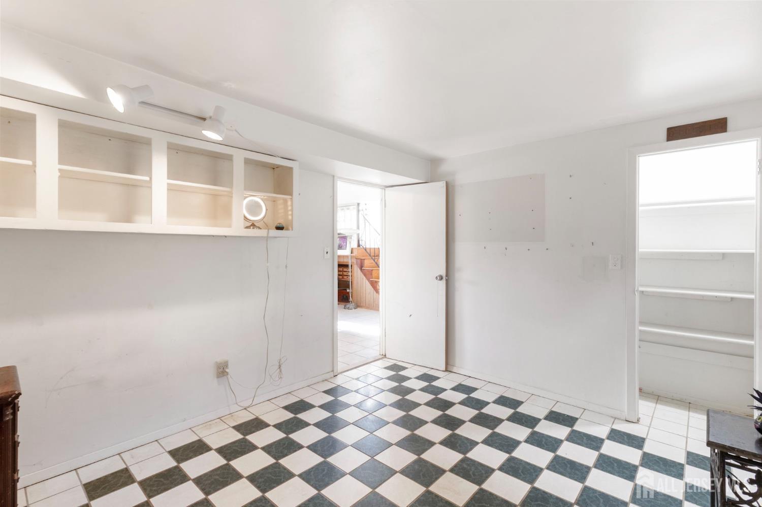 55 Sullivan Way East Brunswick, NJ 08816 - Photo 5 of 38 a bedroom with a bed and a window