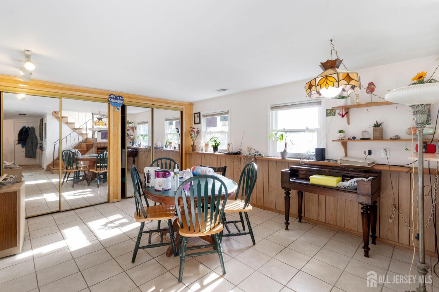 55 Sullivan Way East Brunswick, NJ 08816 - Photo 7 of 38 a dining room filled with furniture and window