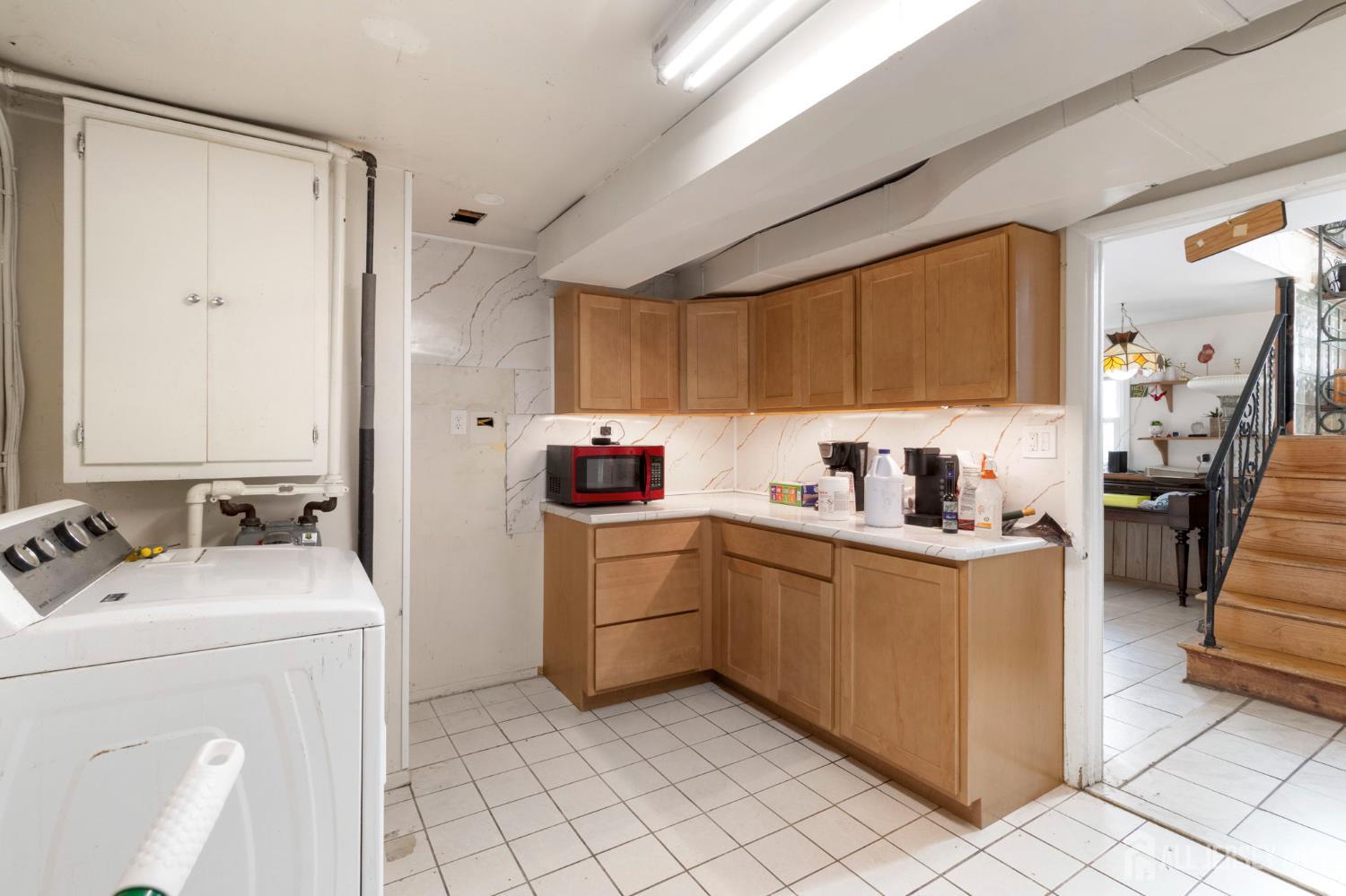 55 Sullivan Way East Brunswick, NJ 08816 - Photo 9 of 38 a room with storage and utility