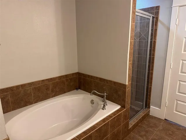 a bathroom with a bathtub