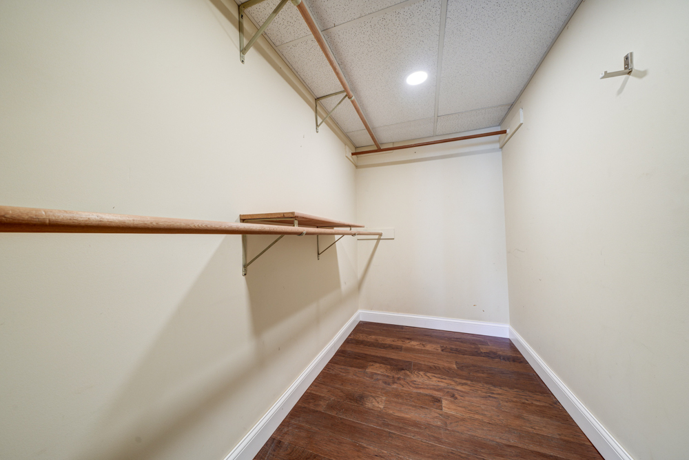 422 Castle Road McHenry, IL 60050 - Photo 24 of 24 a view of a room with wooden floor and staircase