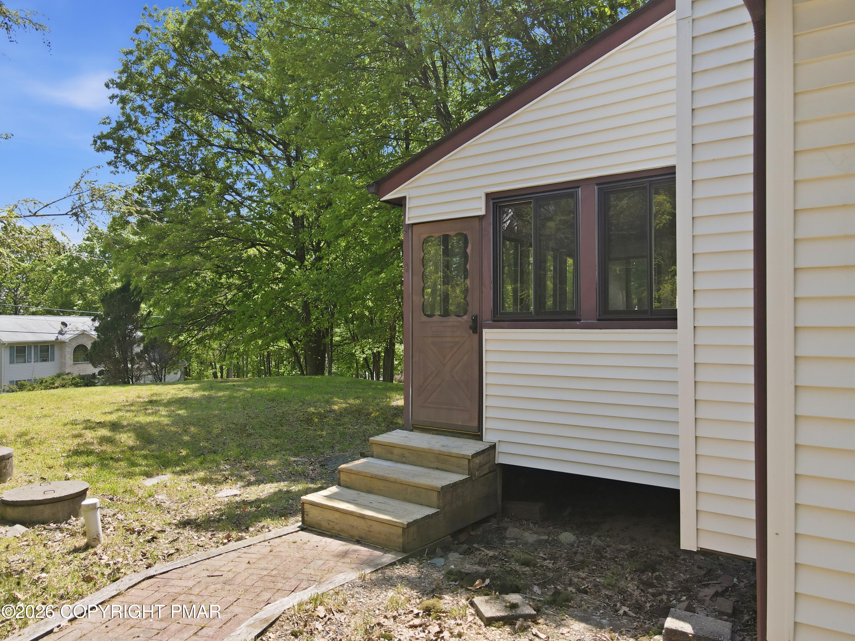 107 Morris Place Bushkill, PA 18324 - Photo 40 of 52 Screen Porch Entrance