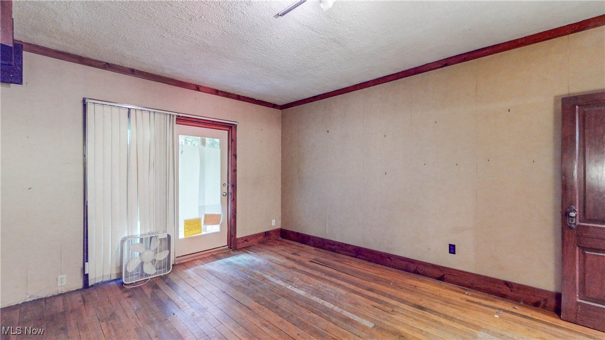 1811 Randolph Road Mogadore, OH 44260 - Photo 7 of 17 Living Room / 1st Floor BR w/hardwood flr and access to full bath