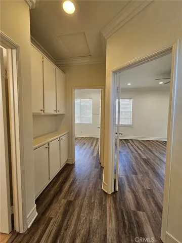 a bathroom with a granite countertop sink a toilet and a mirror