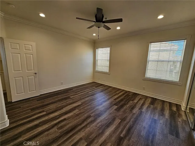 a bathroom with double sink and a mirror