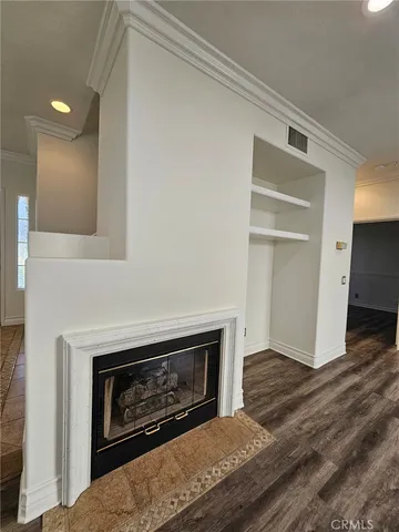 a living room with a fireplace
