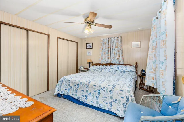 a bedroom with a bed and furniture