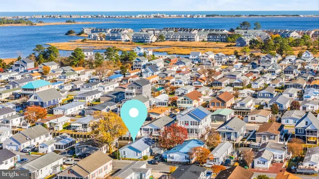 an aerial view of residential building and lake view