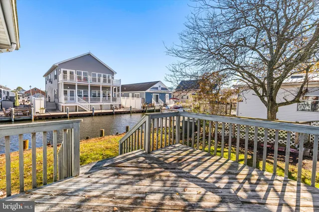 a view of a large building next to a lake